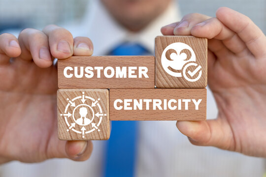 Customer First — business handshake